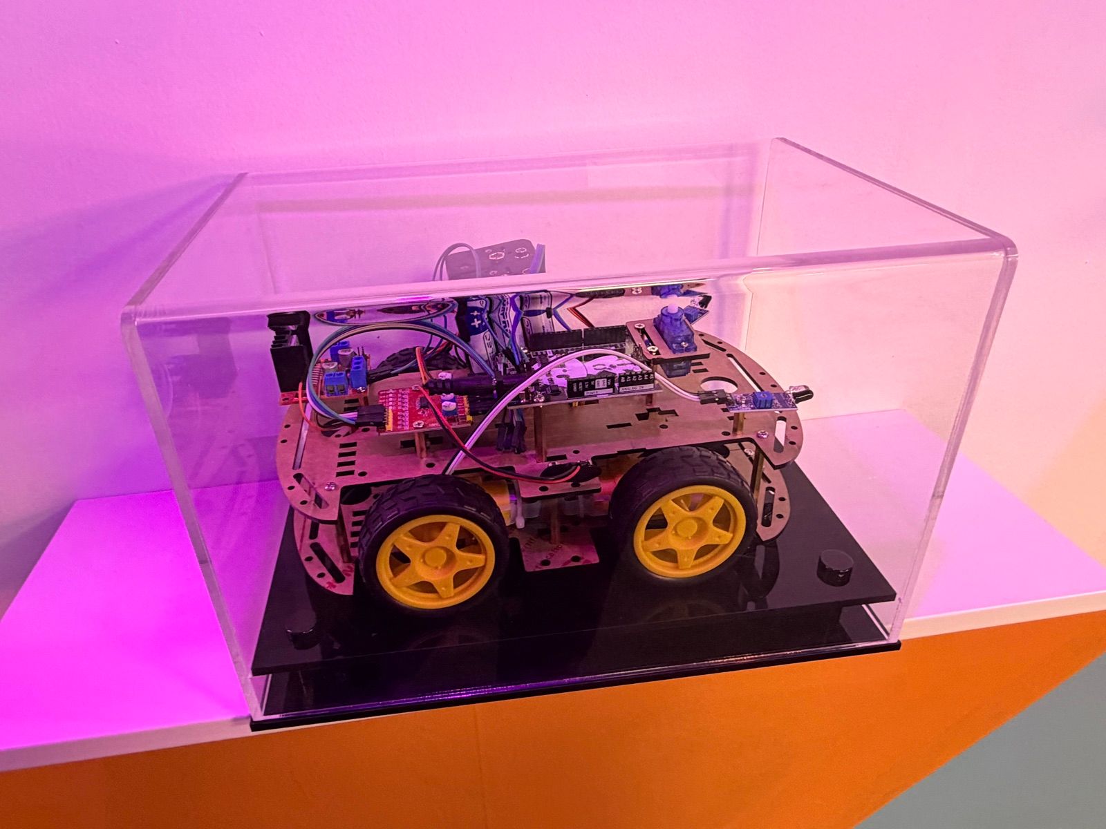 A robot car in a display case