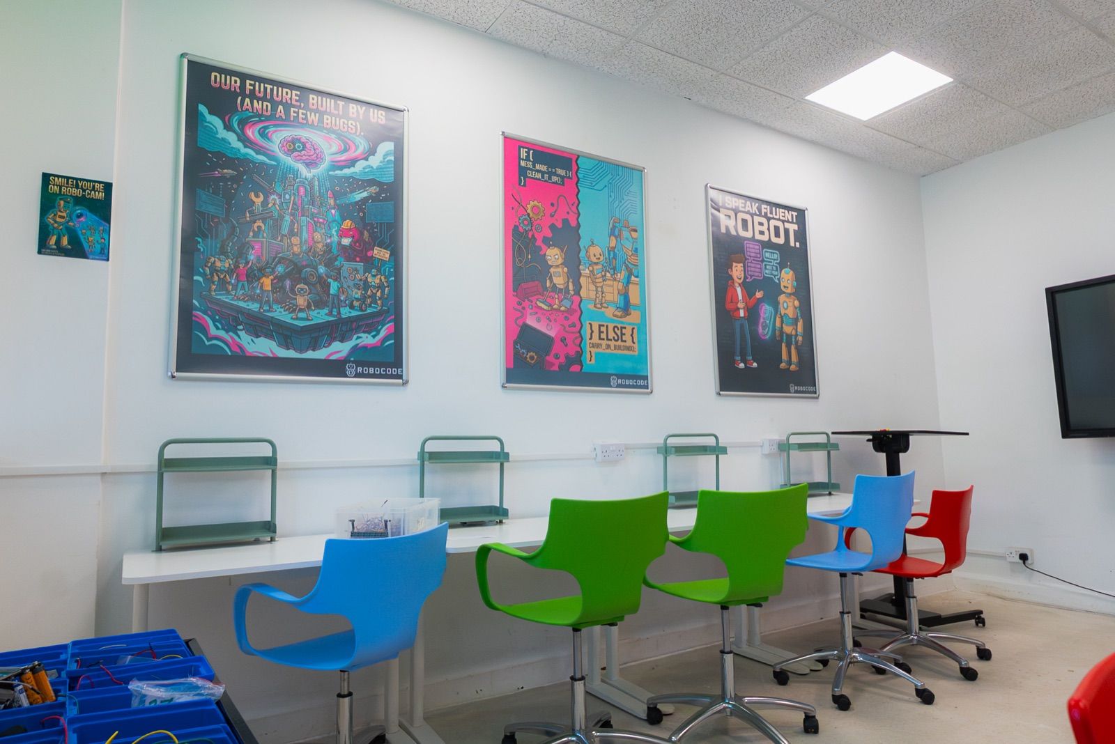 A robotics Studio Lab with colour-coded chairs